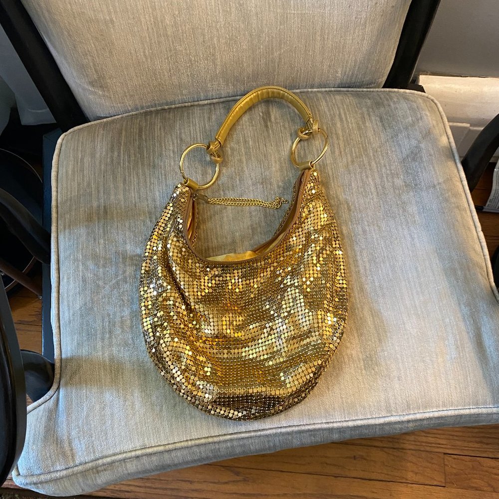 Golden evening handbag and lipstick carrier